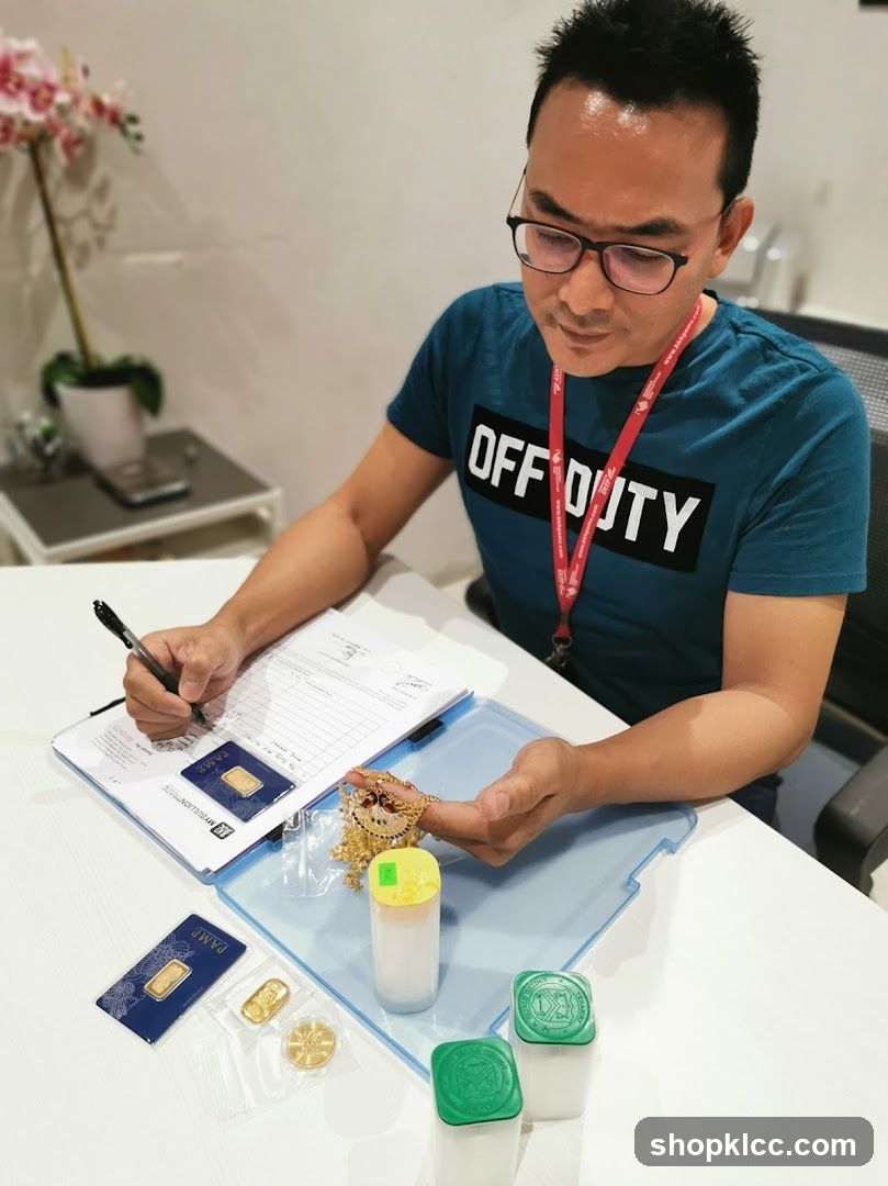 Man examining gold jewelry and bars