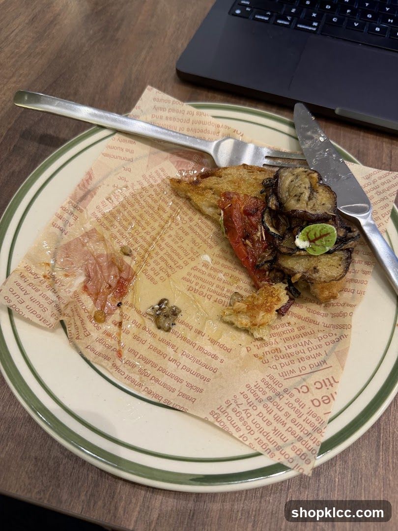Partially Eaten Dish with Laptop