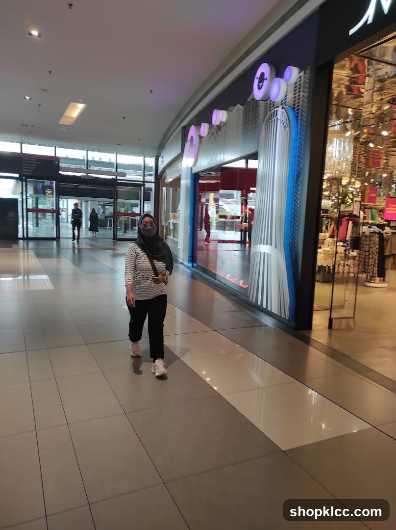 Woman walking in a mall