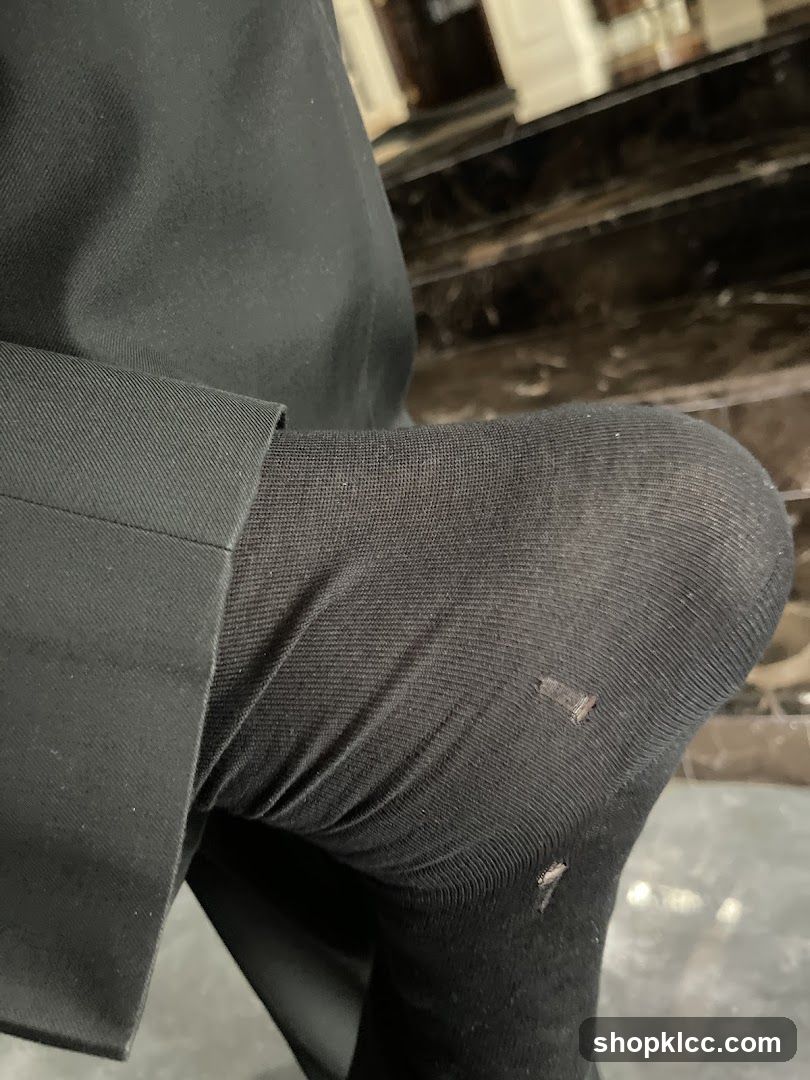 Torn Black Sock