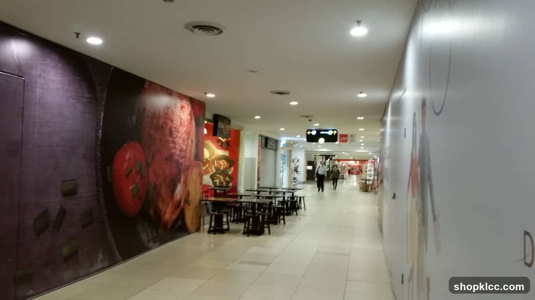 Indoor Mall Corridor with Food Display and Seating