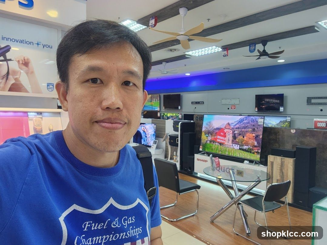 Man in Electronics Store