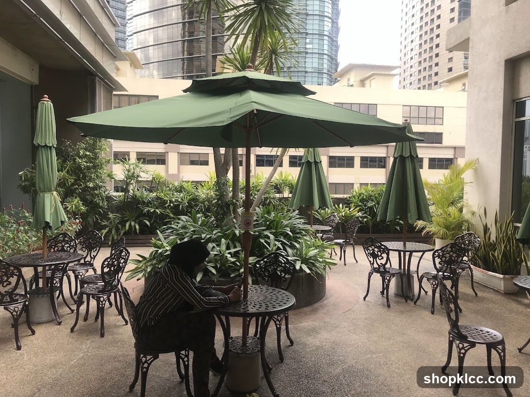 Outdoor Seating Area with Umbrellas and Plants