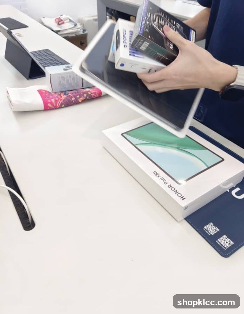 Person holding electronic devices