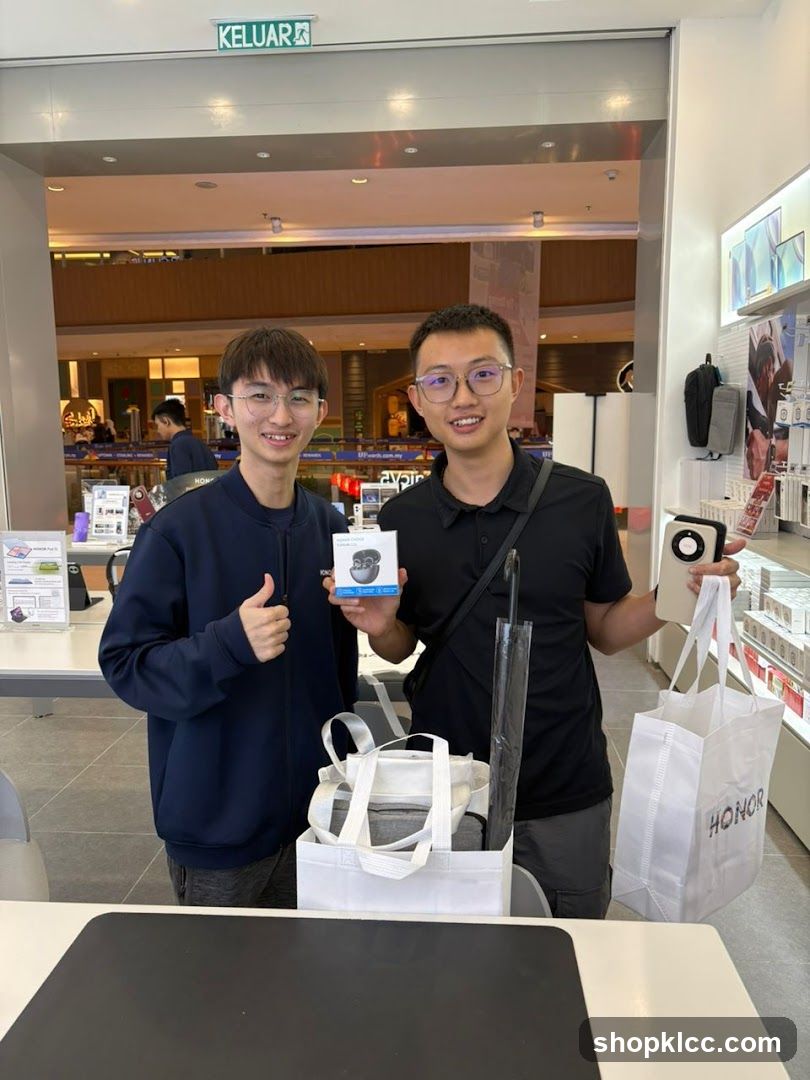 Two men with shopping bags and a product