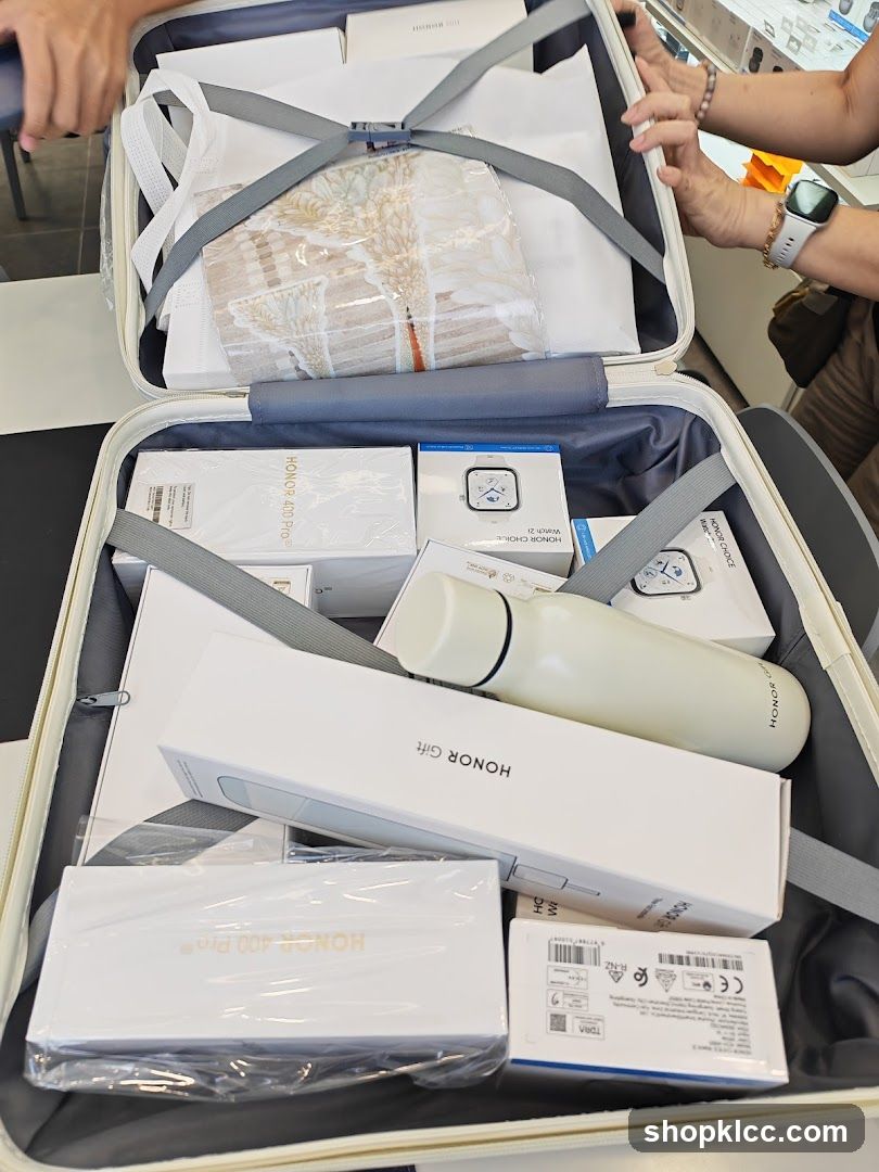 Suitcase filled with Honor products