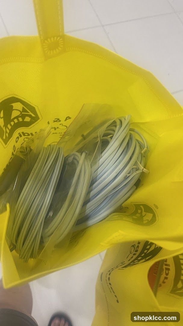 Yellow reusable bag with packaged items