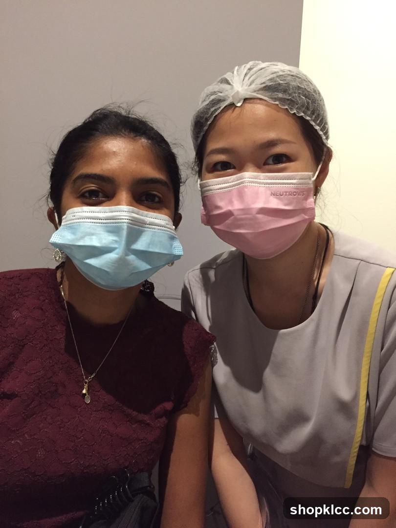 Two women wearing face masks