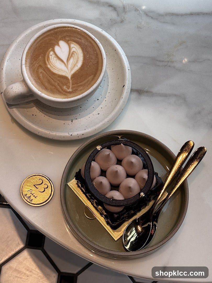 Latte and Dessert on Marble Table