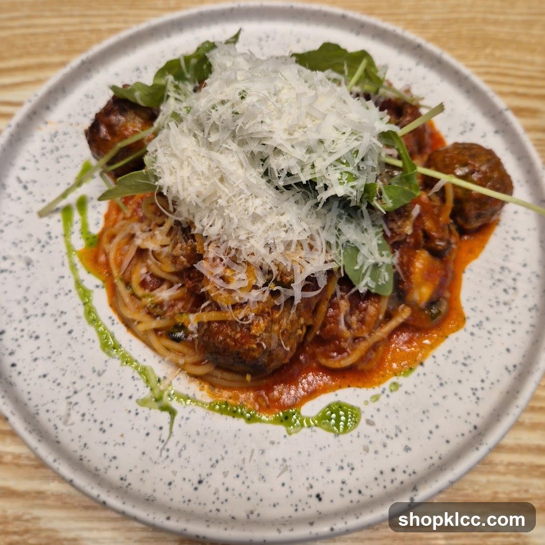 Spaghetti with Meatballs and Arugula