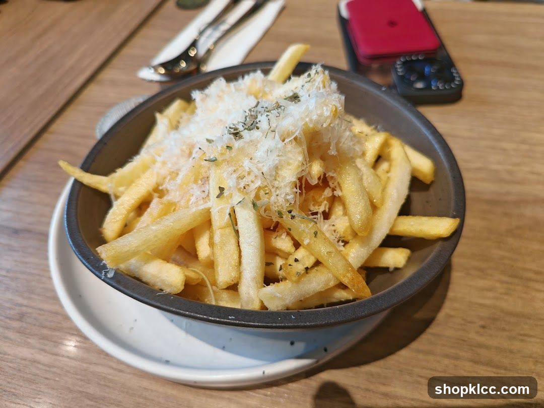 Bowl of Fries with Cheese and Herbs