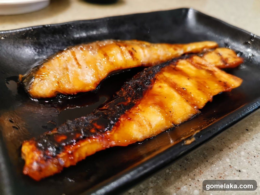 Grilled Fish on Black Plate