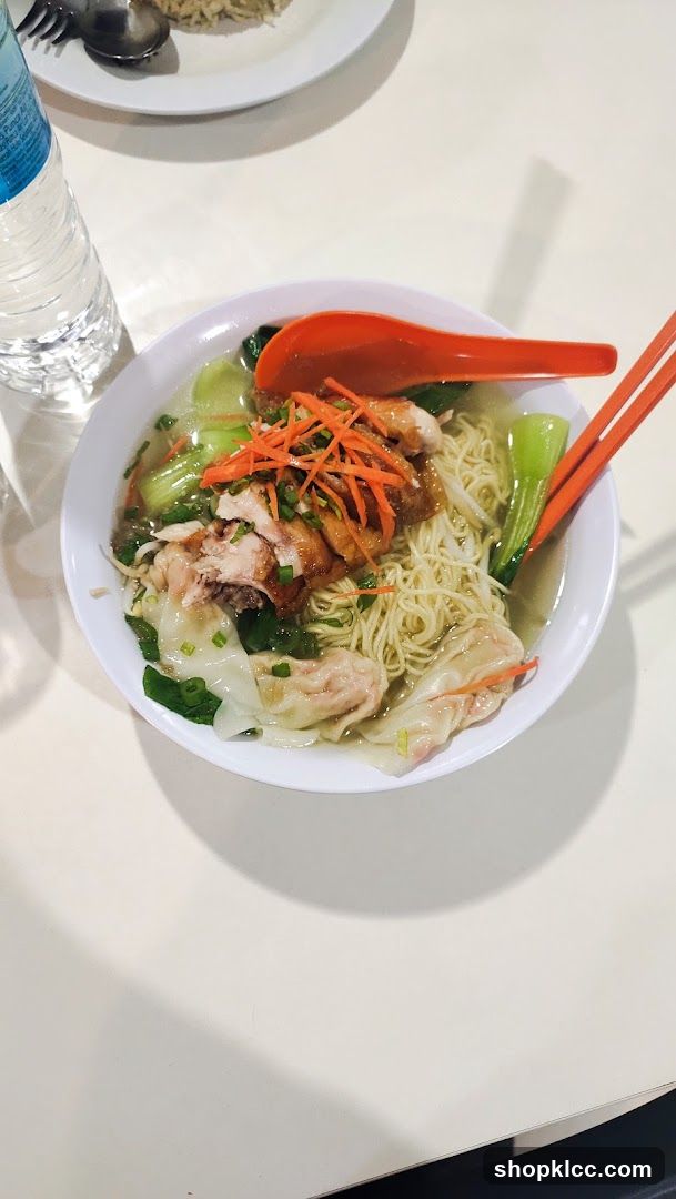 Bowl of Noodle Soup with Chicken and Vegetables