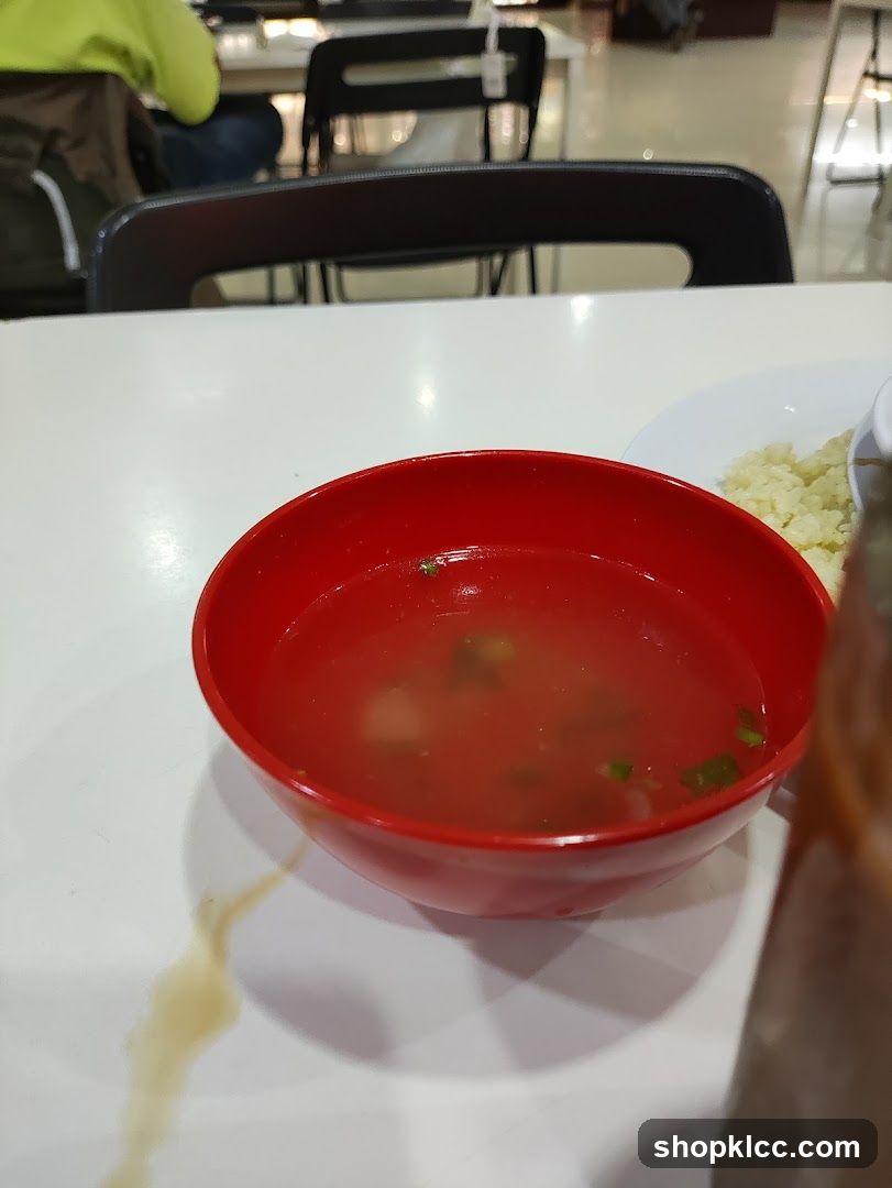 Red Bowl of Soup on White Table
