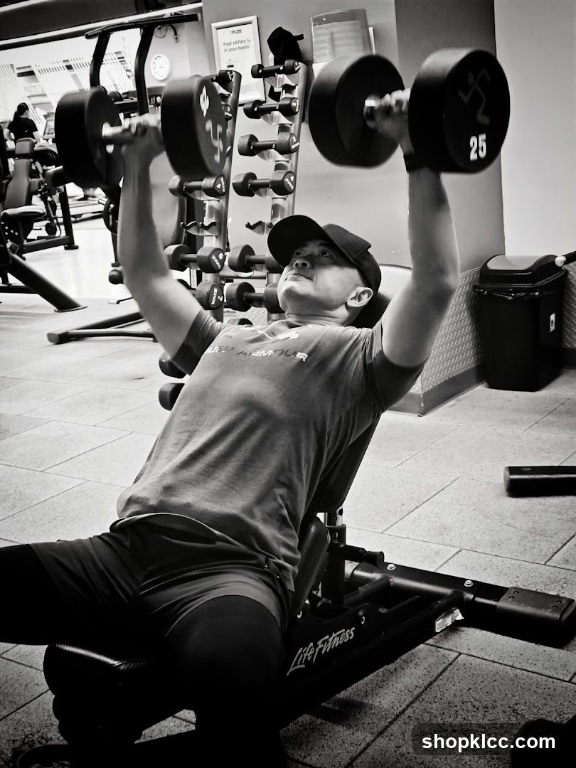 Gym Interior with Person Lifting Weights