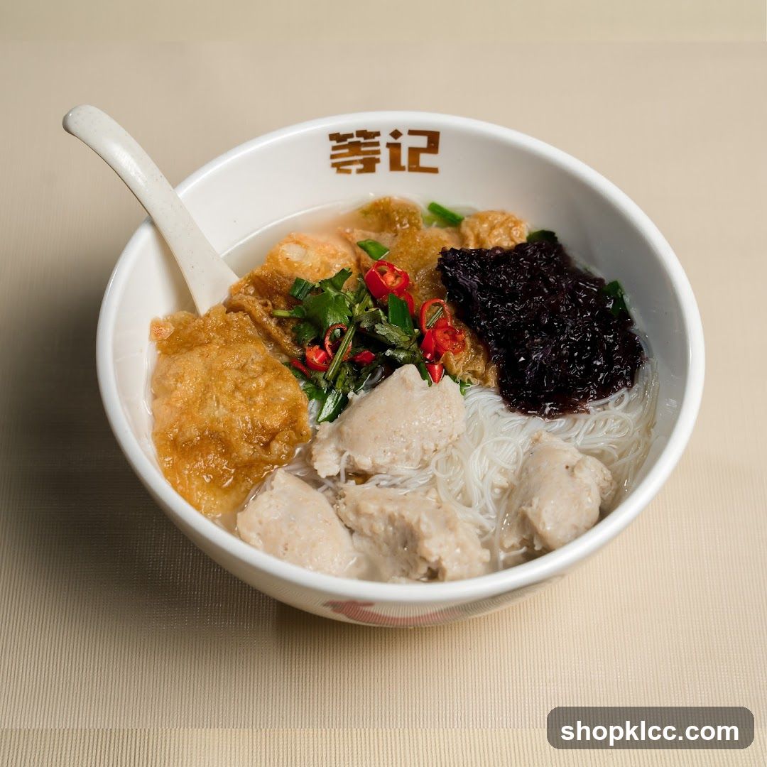 Bowl of Noodle Soup with Toppings