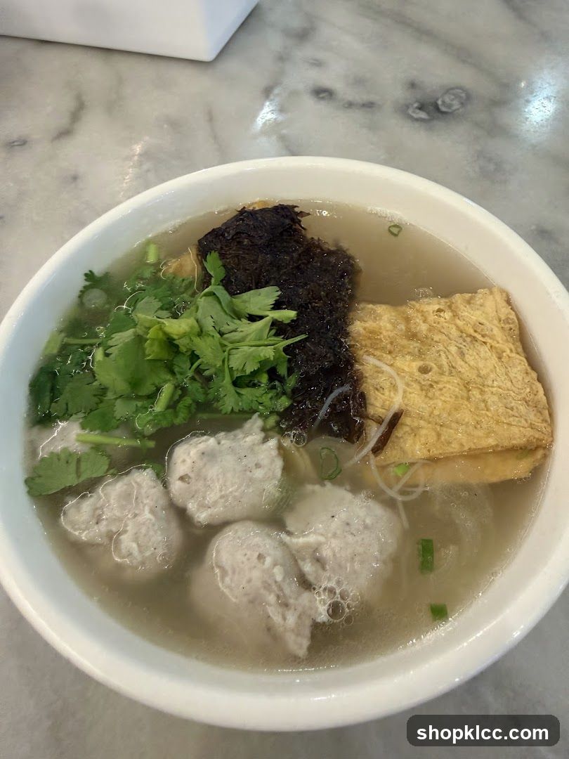 Bowl of Soup with Meatballs and Tofu