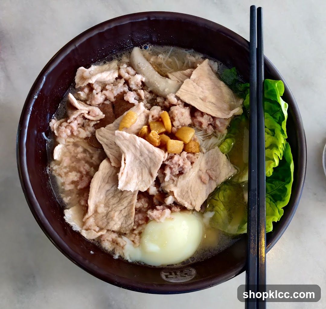 Bowl of Noodle Soup with Meat and Egg