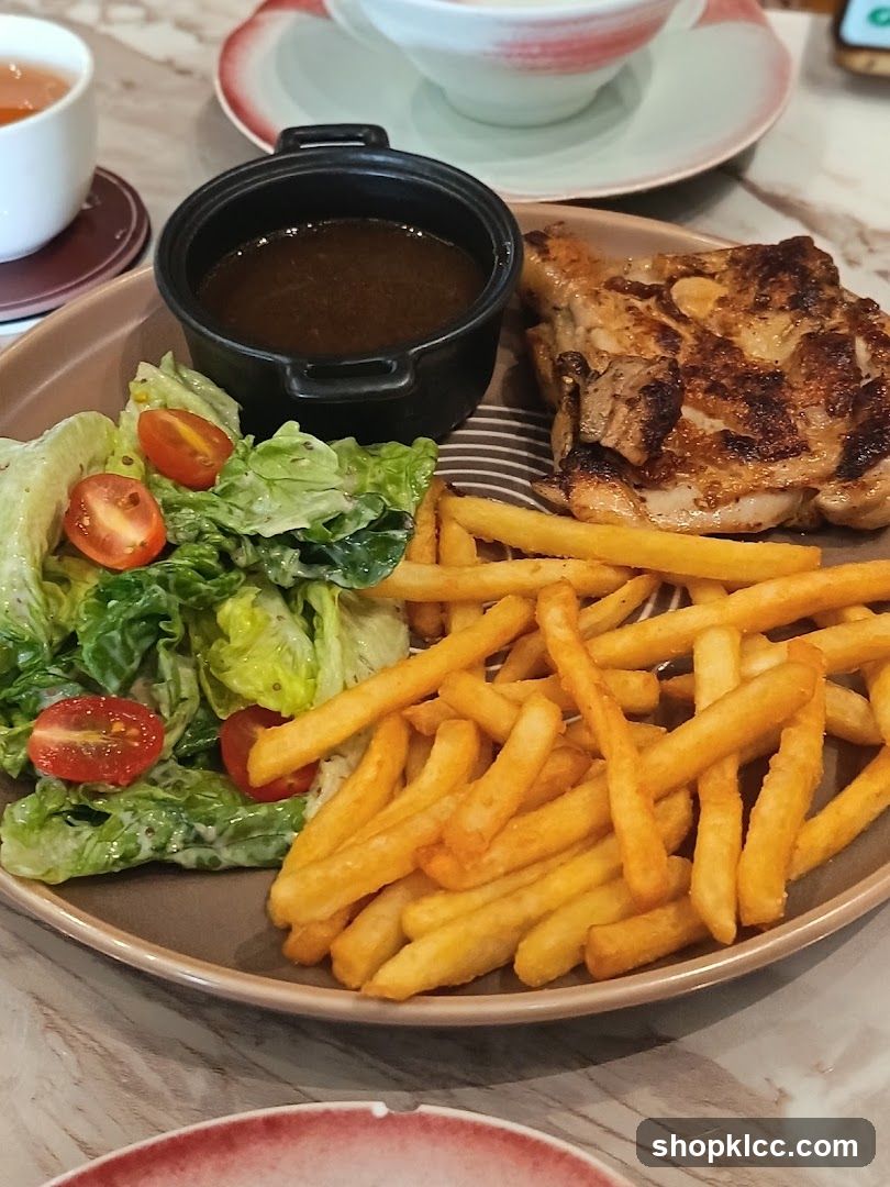 Grilled Chicken Meal with Fries and Salad
