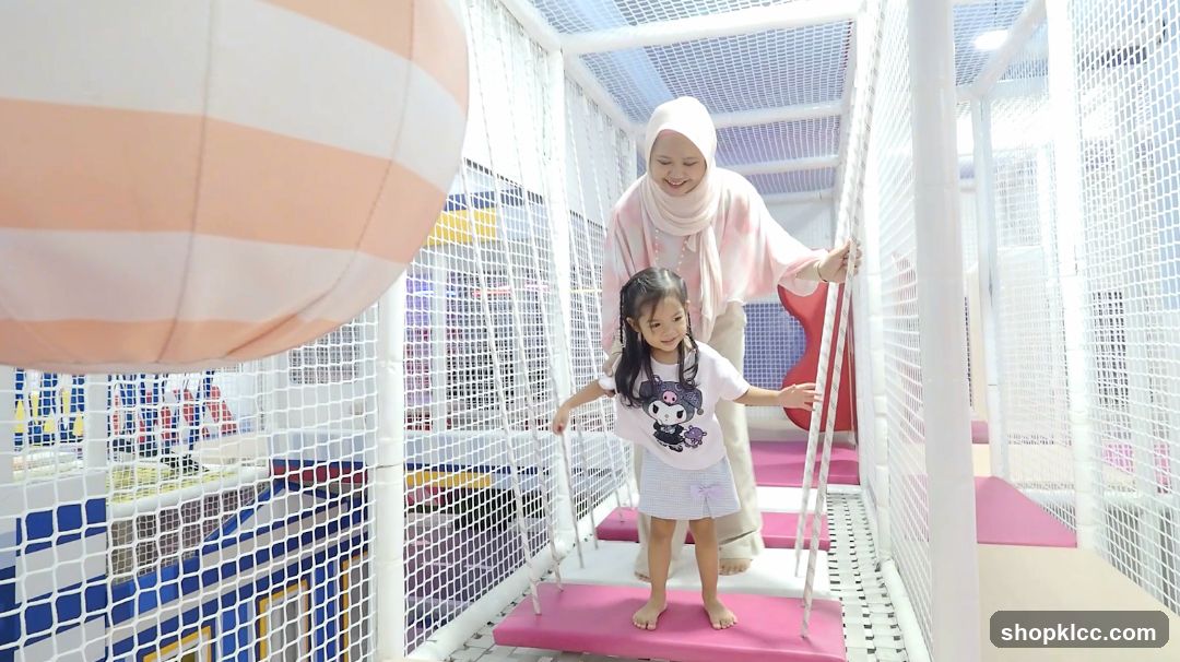 Indoor Play Area with Adult and Child
