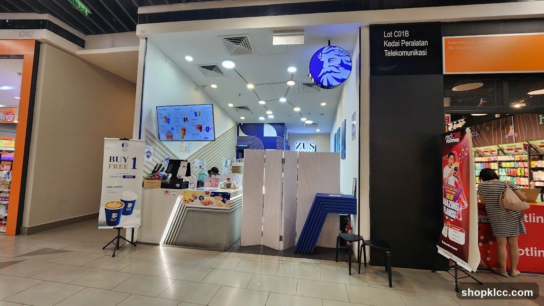 Shopping Mall Interior with Storefronts and Displays