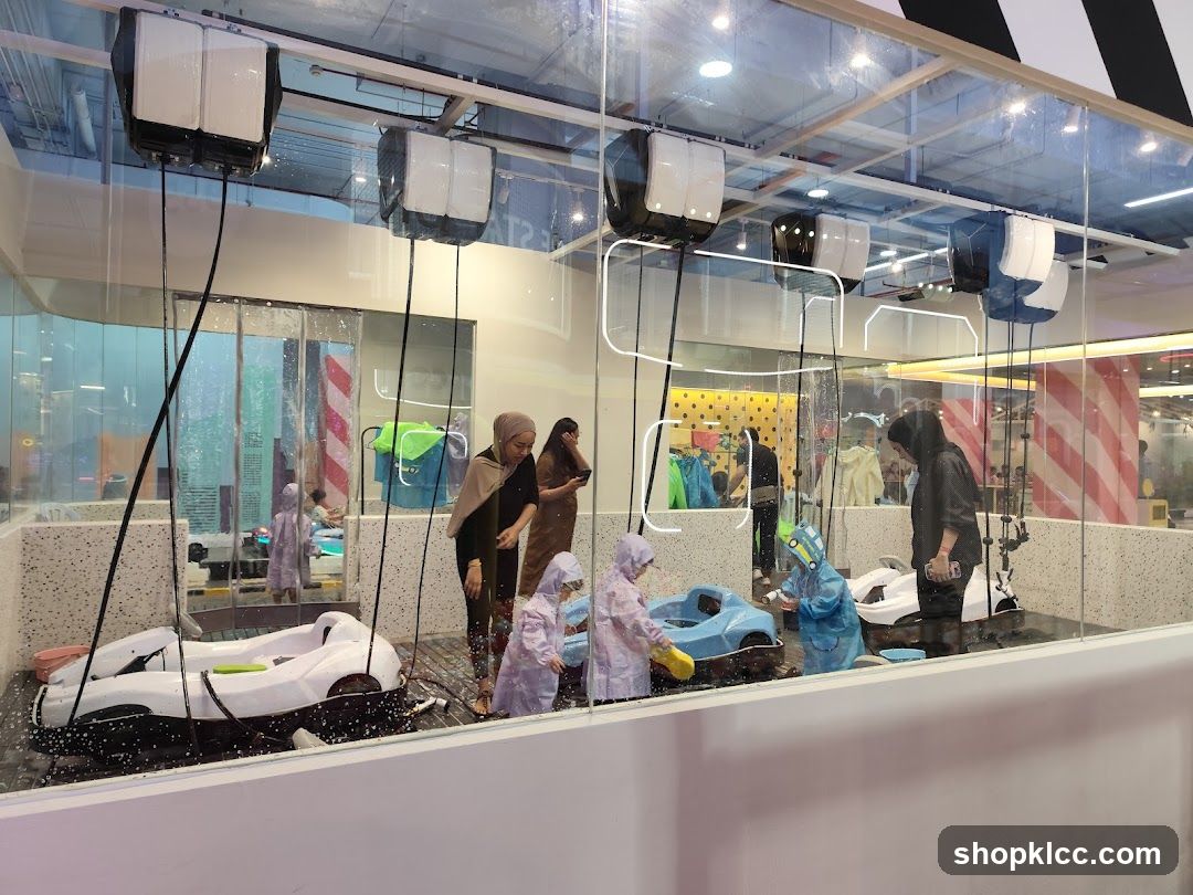 Indoor Water Play Area with Kids in Raincoats