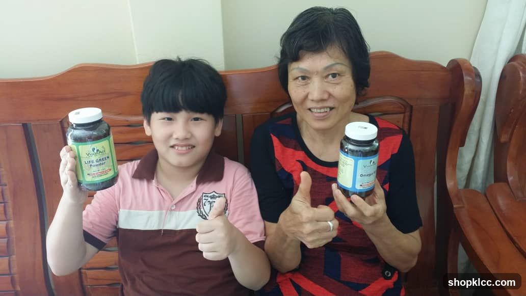 Two people holding health supplement bottles
