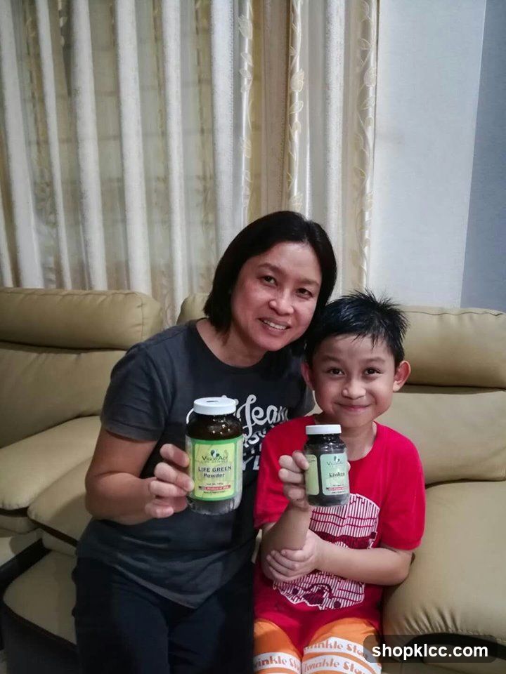 Mother and son holding supplement bottles