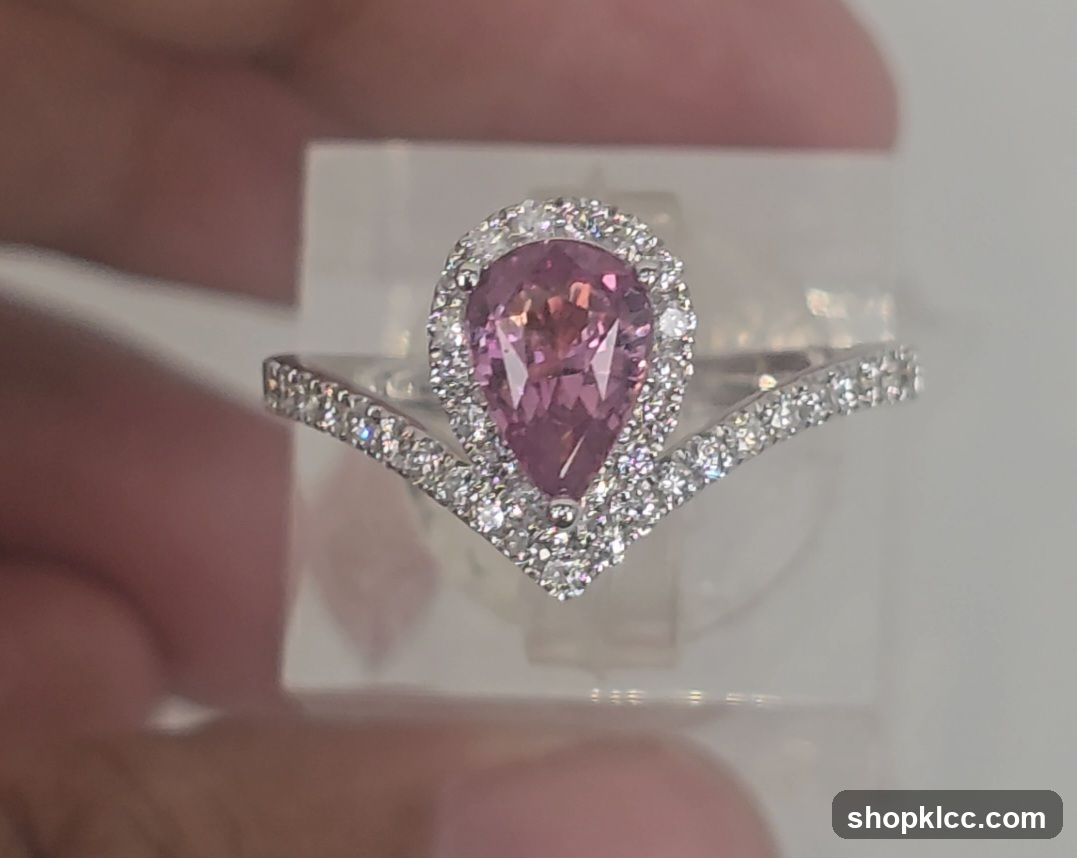 Peach Sapphire Ring with Diamond Halo