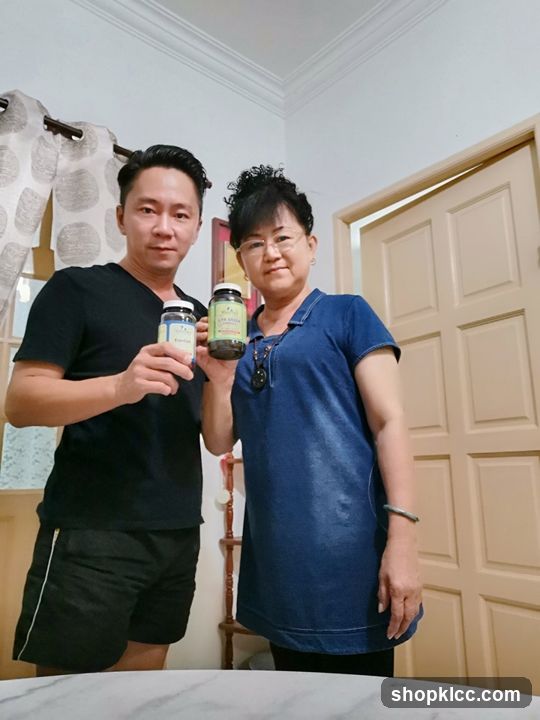 Two people holding jars indoors
