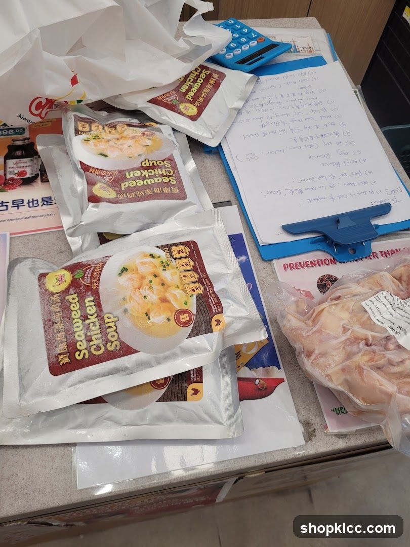 Seaweed Chicken Soup Packages and Raw Chicken on Counter