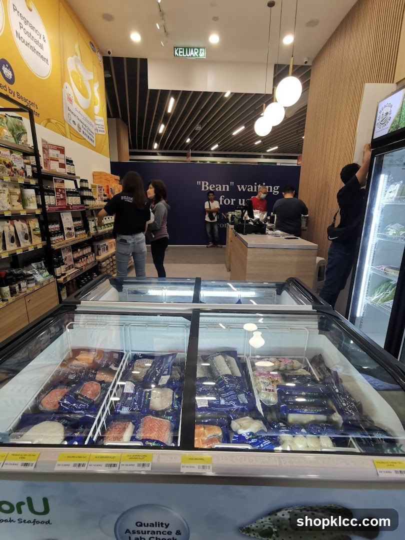 Interior of a grocery store with frozen seafood display