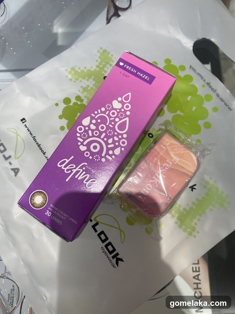 Contact Lens Box and Makeup on Shopping Bag