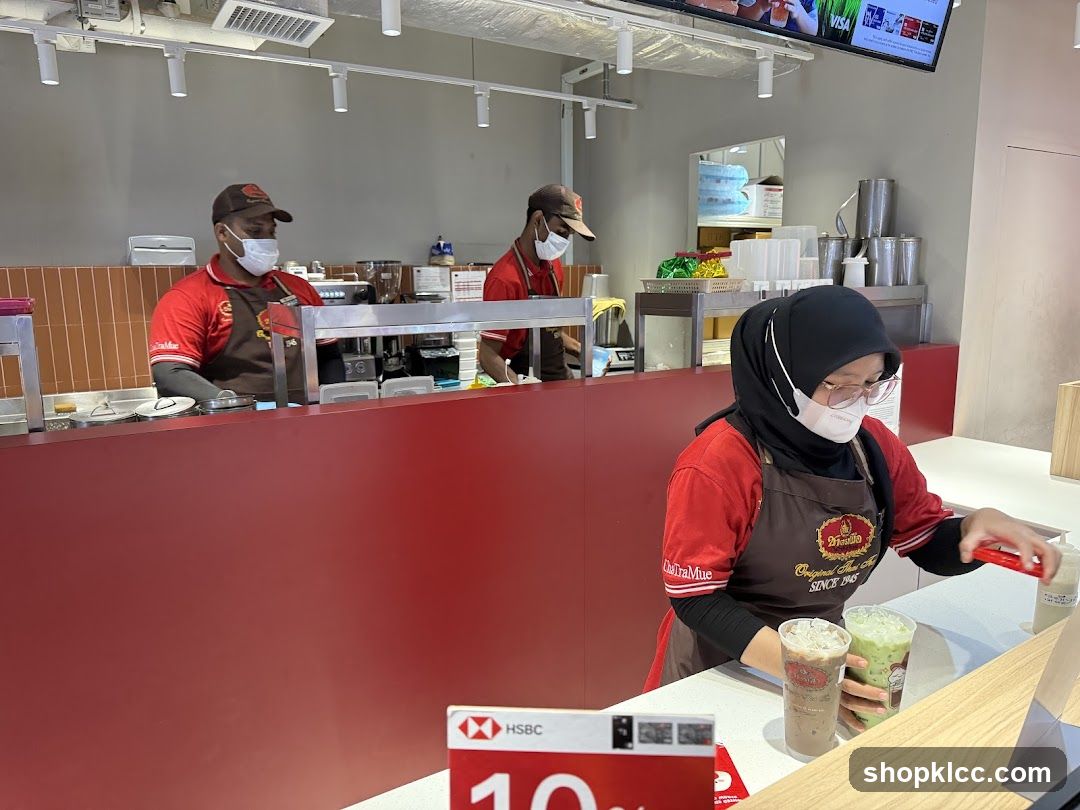 Coffee Shop Interior with Staff