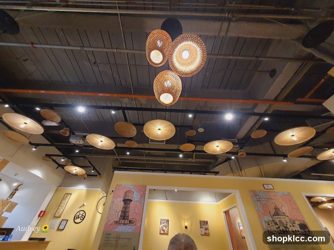 Interior with hanging woven lamps and wall art