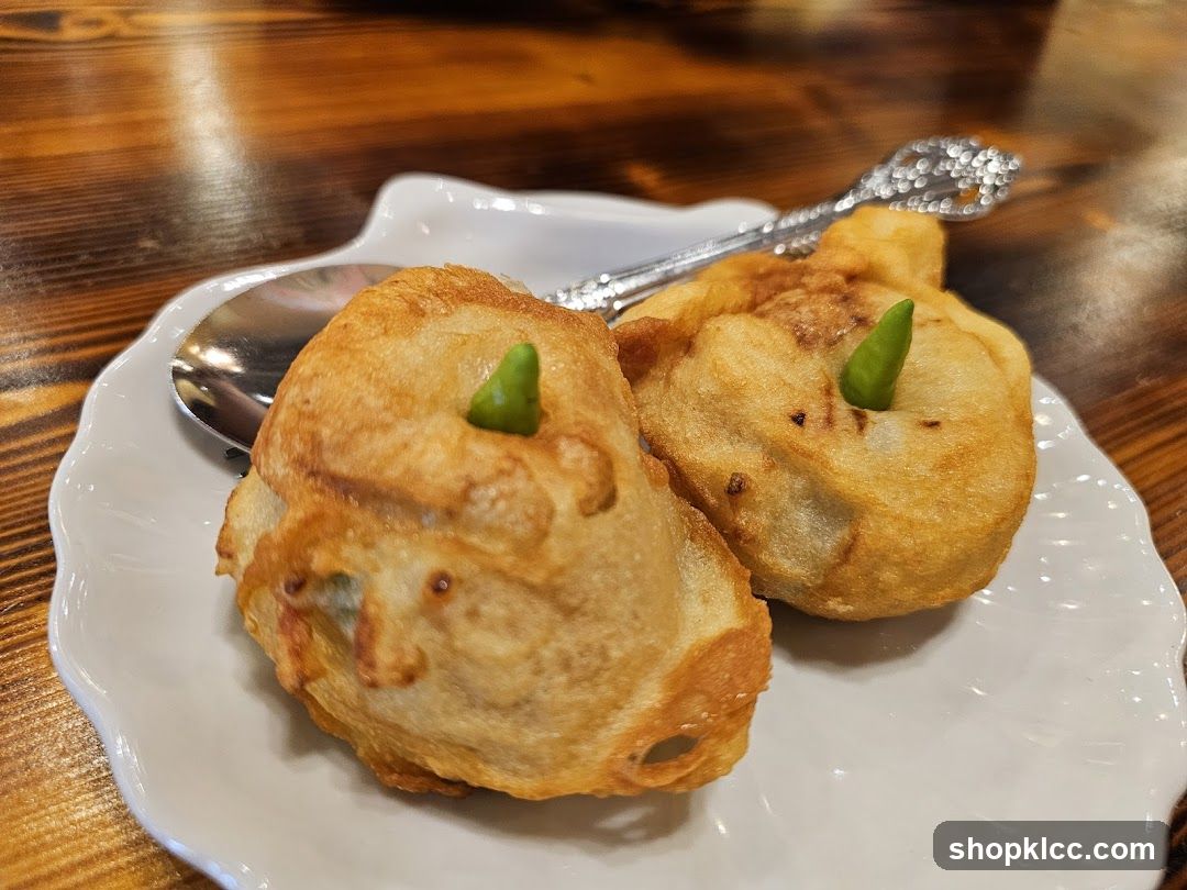 Fried Dumplings with Green Chili Garnish
