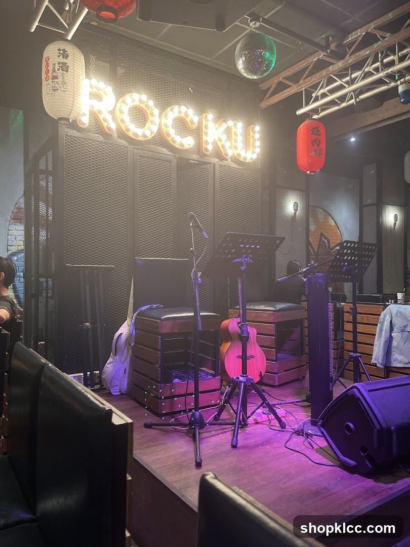 Stage with "ROCKU" sign