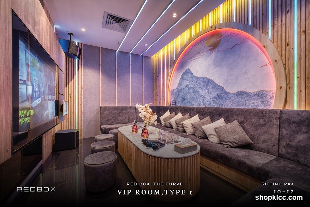 VIP Room Interior with Neon Accents and Mountain Artwork