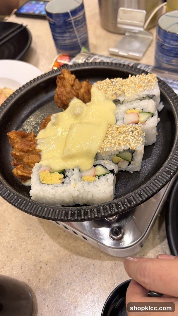 Sushi and Fried Chicken with Cheese Sauce