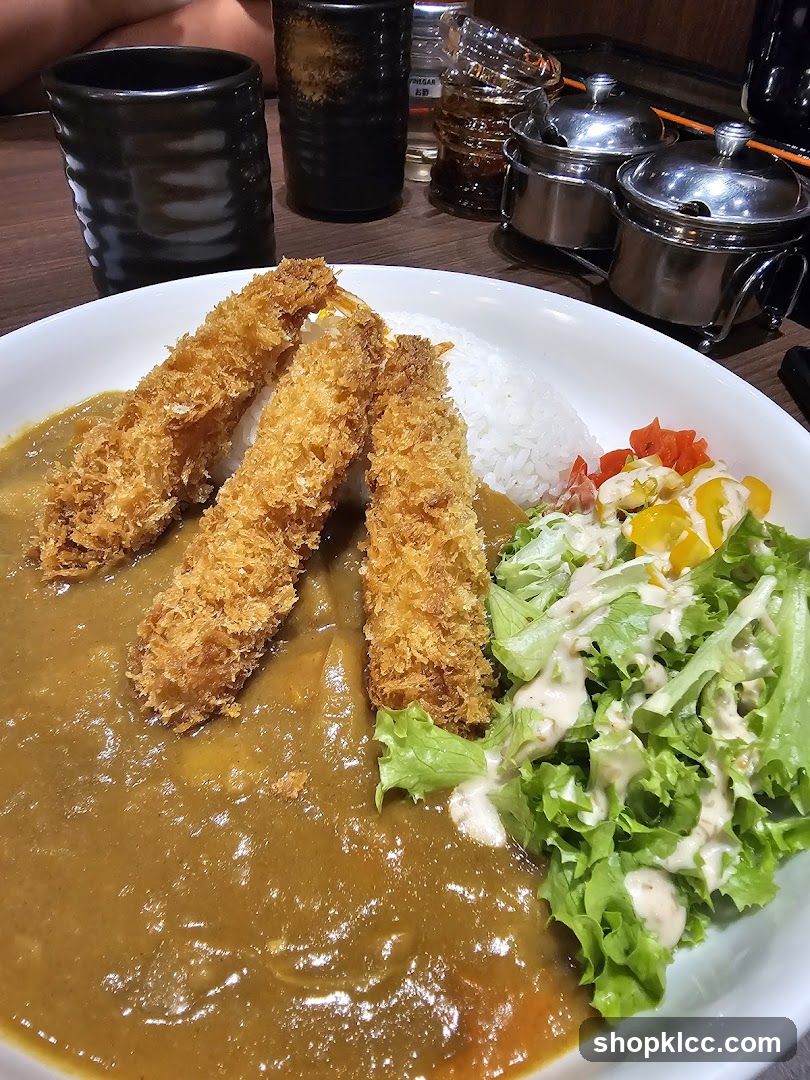 Curry Rice with Fried Fish and Salad