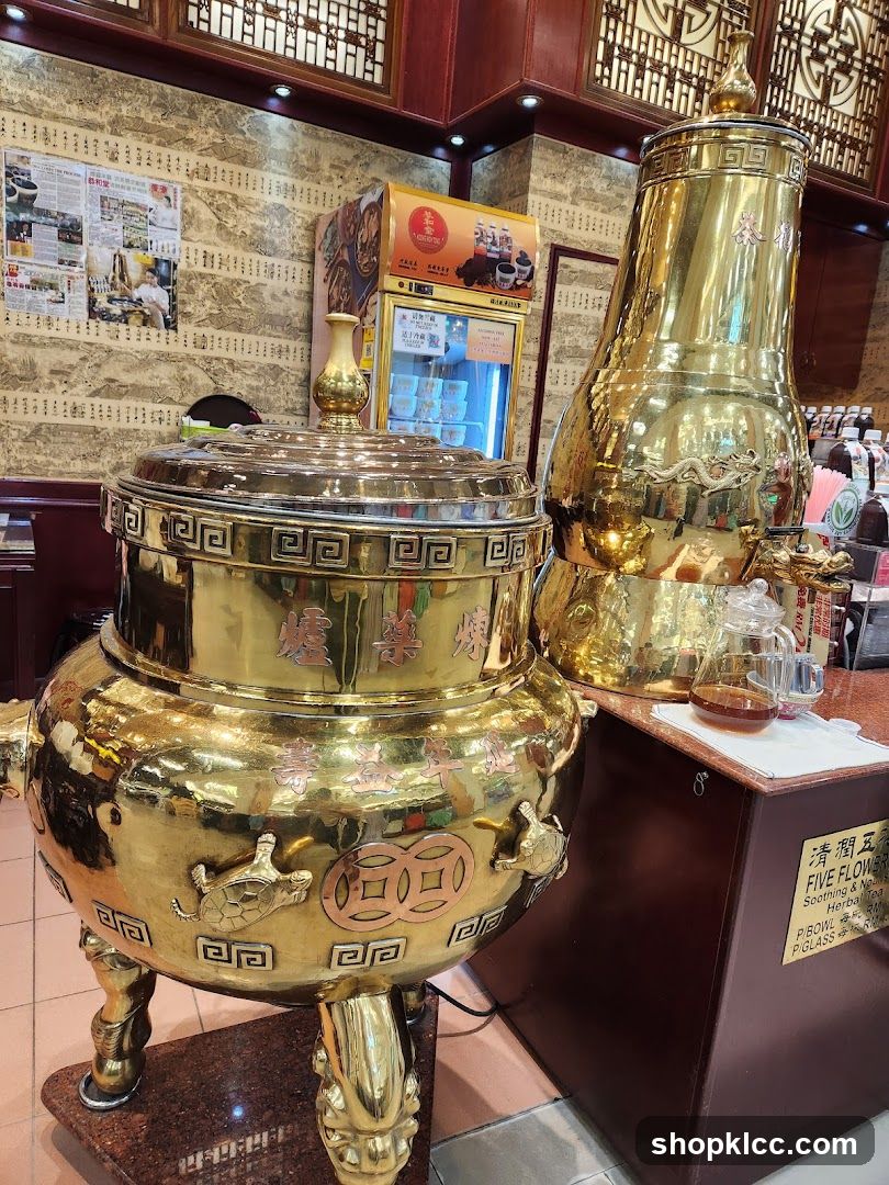 Interior of a tea shop with golden urns
