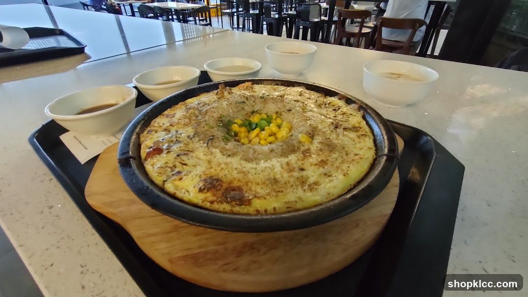 Sizzling Dish with Corn and Peas