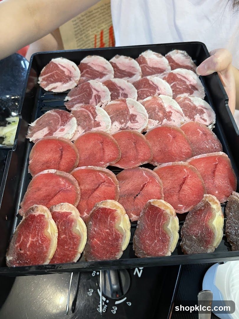 Raw Beef Slices on Tray