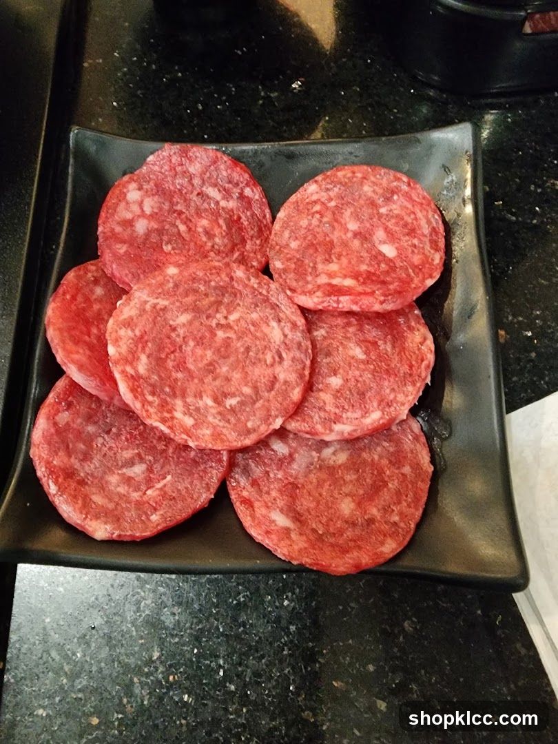 Sliced Meat on Black Plate