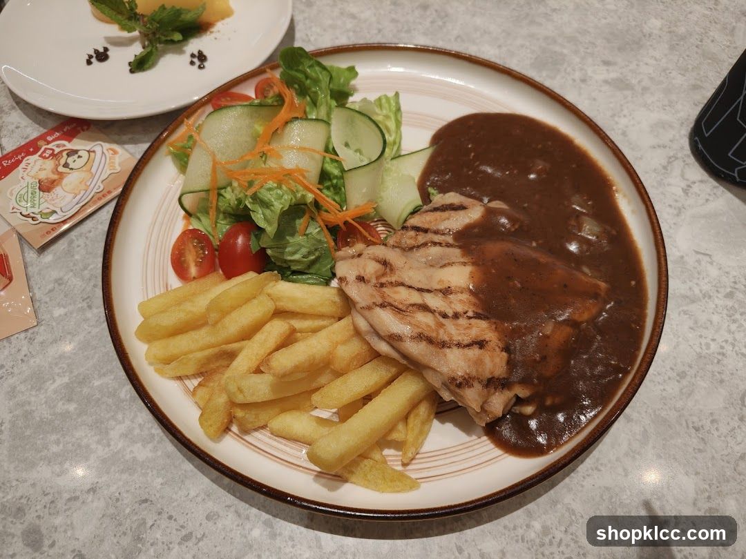 Grilled Chicken Steak with Fries and Salad