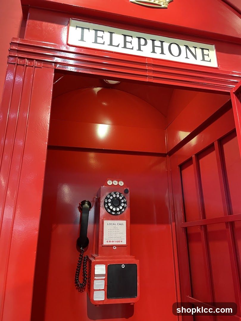 Red Telephone Booth with Vintage Phone