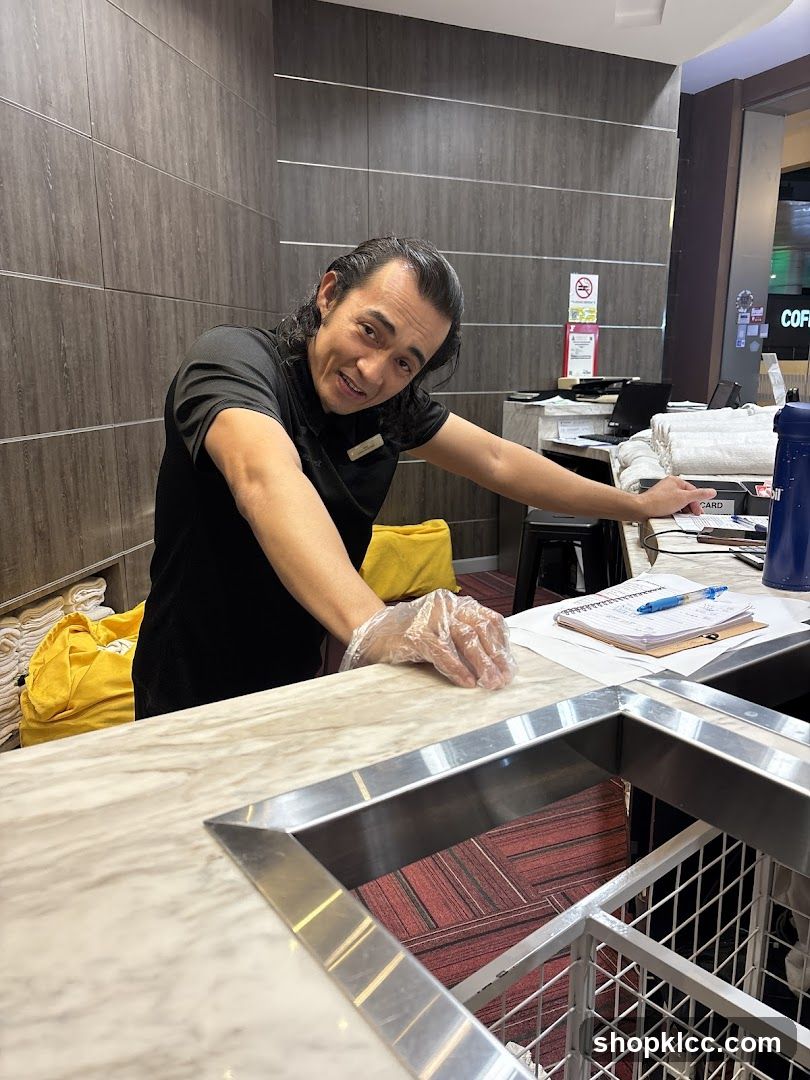Staff member at a counter