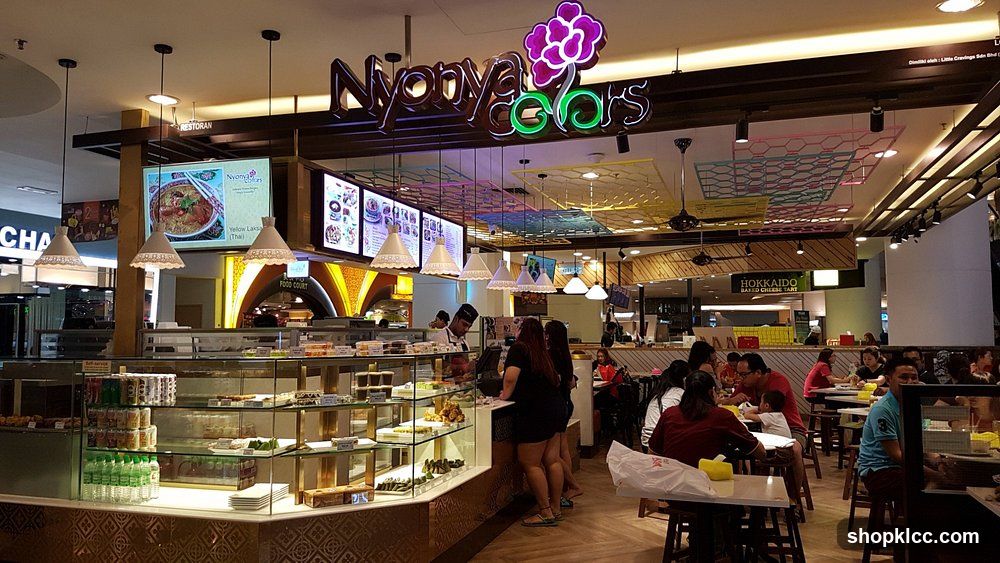 Food court with seating and food stalls