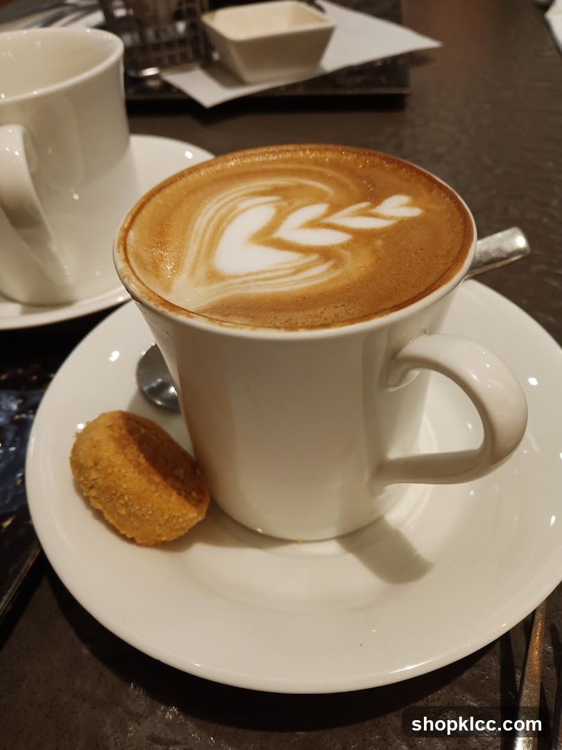 Latte with Latte Art and Cookie