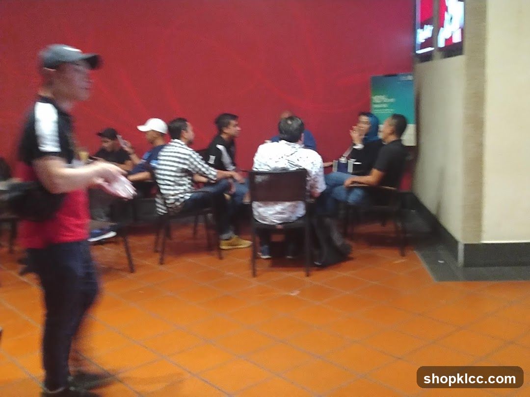 Group of people sitting in a waiting area